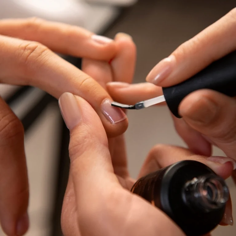 woman-getting-manicure-high-angle